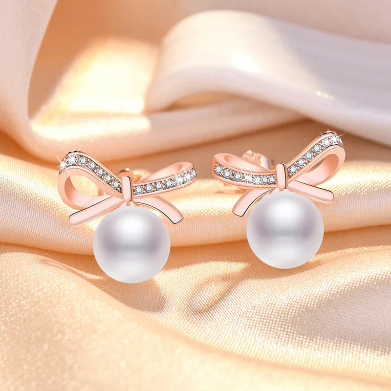 Gold Plated American Diamond Studded Bow-Tie Shape Korean Stud Earrings