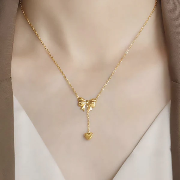 Gold Plated Anti Tarnish Heart Themed Bow inspired Pendant