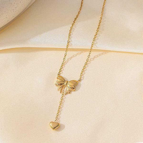 Gold Plated Anti Tarnish Heart Themed Bow inspired Pendant