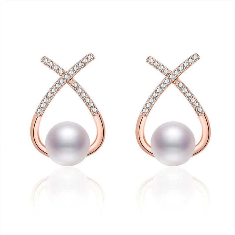 Gold Plated American Diamond Studded Cross Shape Korean Stud Earrings